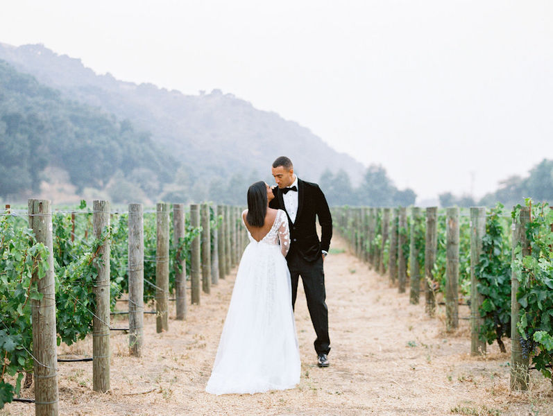 bride and groom gazing at each other at Lavender Oak Vineyard